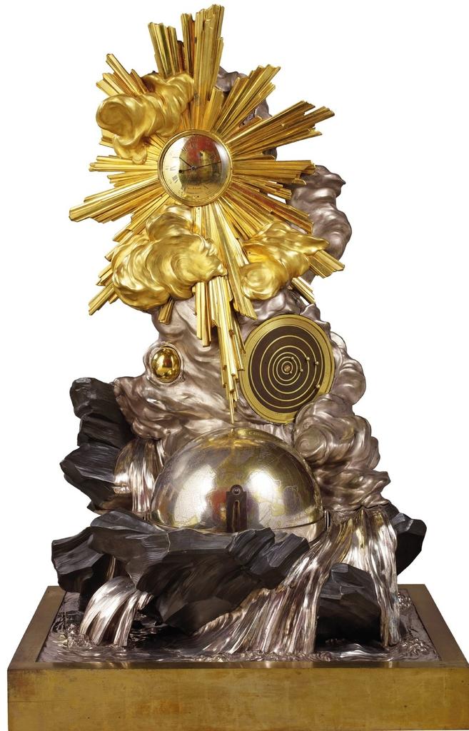 Claude Siméon Passemant, pendule La Création du monde, Paris, 1754. Laiton, fer, bronze patiné, argenté et doré, verre, H. 143 ; L. 83 ; P. 73 cm. Paris, musée du Louvre, en dépôt au musée national des châteaux de Versailles et de Trianon.