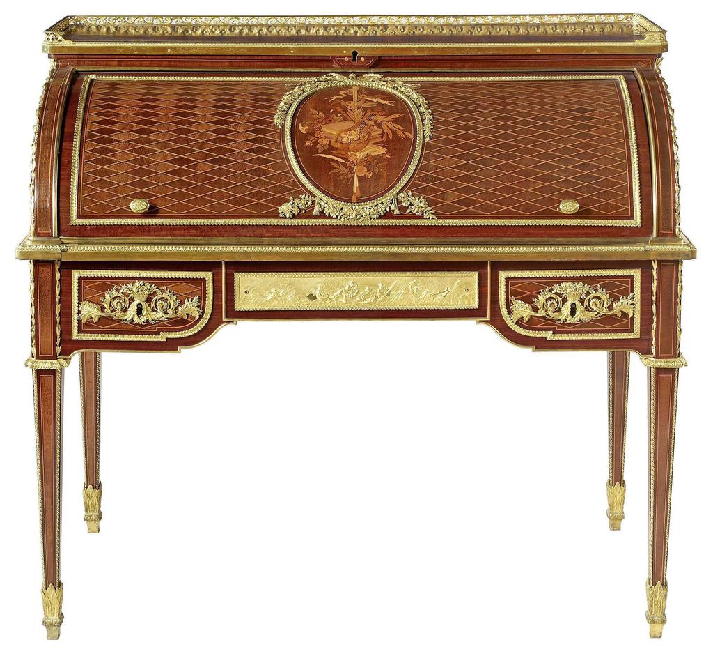 J.-H. Riesener (1734-1806), secrétaire à cylindre exécuté en 1784 pour Marie-Antoinette aux Tuileries. Les frises de bronze attribuées à N.-A. ou Fr.-A. Damerat d’après L.-S. Boizot, les poignées à Martincourt. Paris, musée du Louvre. 