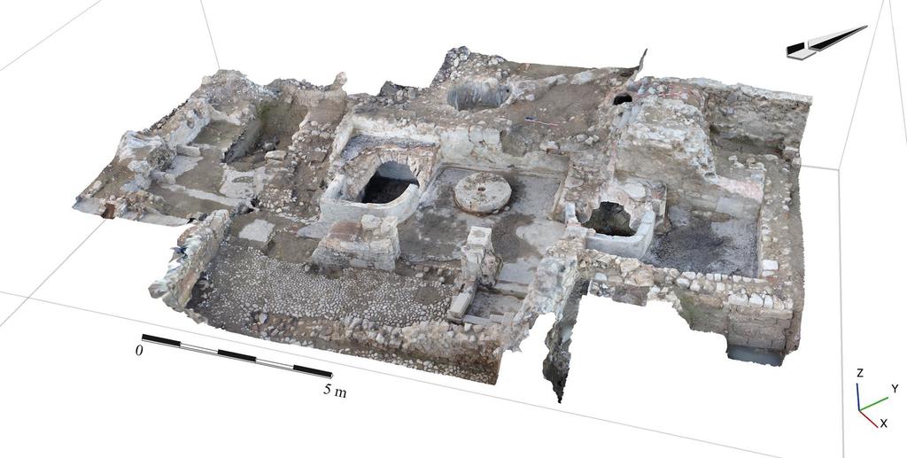 Photogrammétrie du moulin avec ses deux chambres humides, accueillant les roues horizontales. La meule a été retrouvée en position non fonctionnelle, déposée au sol. 