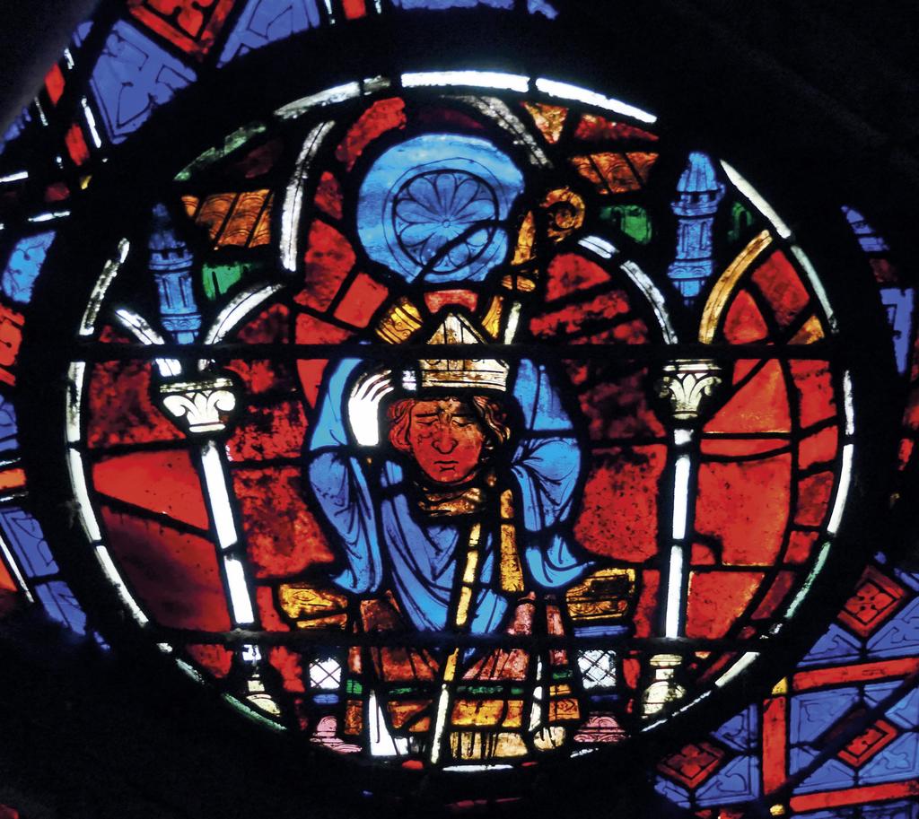 Détail d’un médaillon de la rose sud représentant saint Denis, XIIIe siècle.