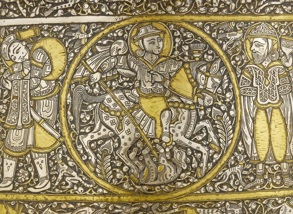 Bassin dit « baptistère de Saint Louis » (détail). Signé : Muhammad ibn al-Zayn. Syrie ou Égypte, vers 1330-1340. Alliage cuivreux ciselé, incrusté d’argent, d’or et de pâte noire, 23,2 x 50 cm. Paris, musée du Louvre, département des Arts de l’Islam.