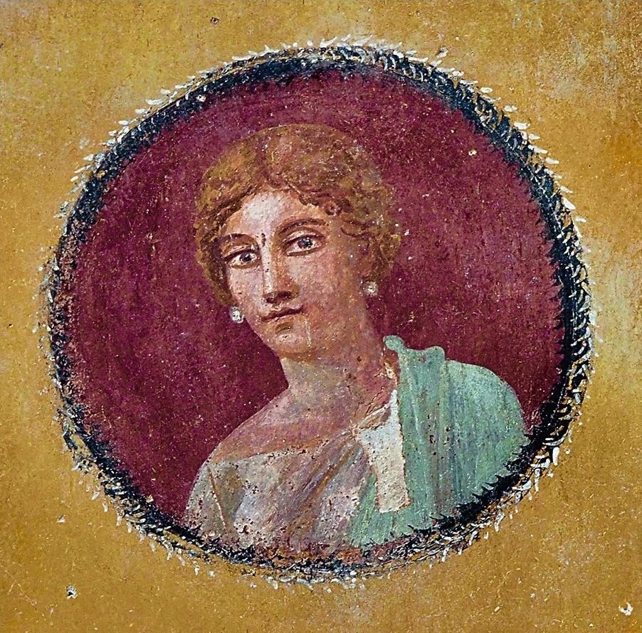 Portrait de femme découvert dans la maison au Jardin. Pompéi, Parc archéologique de Pompéi.
