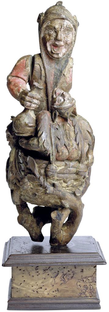 Bâton de la compagnie de la Mère-Folle de Dijon, Dijon, 1482 (?). Bois polychromé, H. 35 ; L. 14 ; P. 14 cm. Dijon, musée Archéologique de Dijon, en dépôt au musée de la Vie bourguignonne.