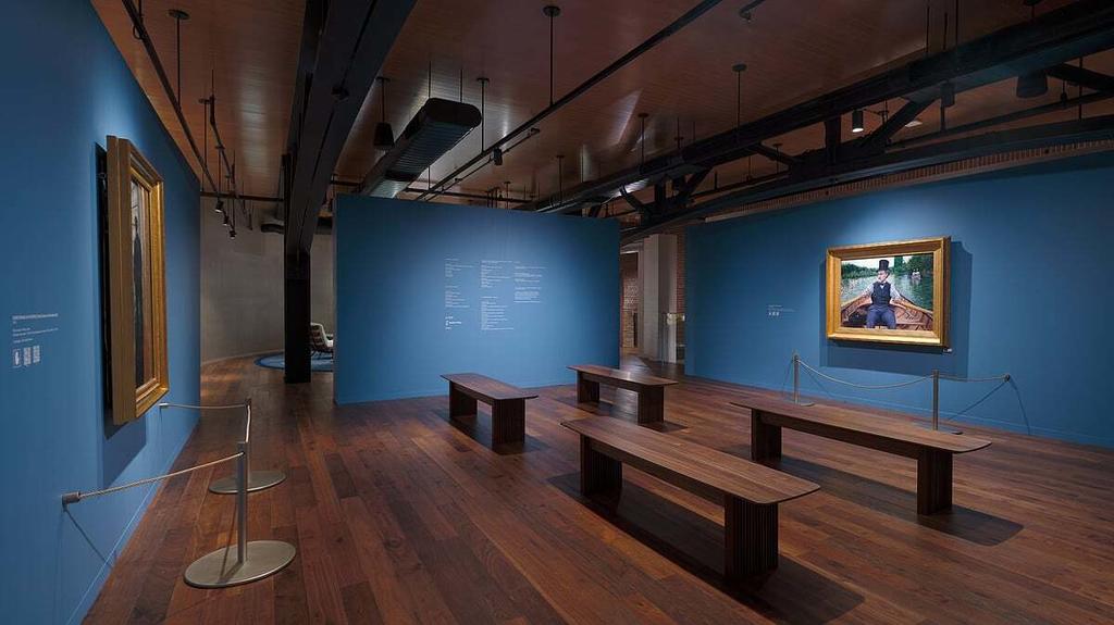 La Partie de bateau exposée dans les locaux de Louis Vuitton à New York, face au Jeune Homme à sa fenêtre prêté par le J. Paul Getty Museum.