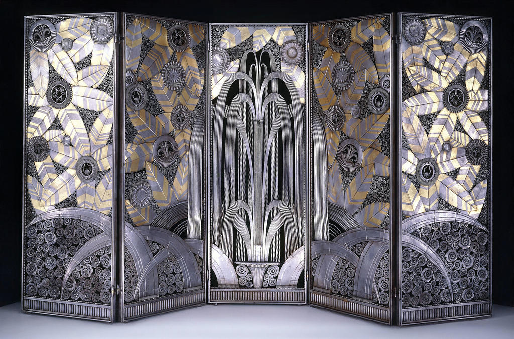 Edgar Brandt, Henri Favier, paravent L’Oasis, présenté auSalon d’automne de 1924 et à l’Exposition internationale de Paris, 1925. Fer, fonte de fer, laiton, H. 181,5 ; L. 63,5 cm (chaque panneau). Collection particulière.