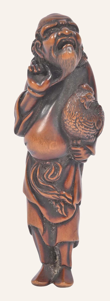 Japon, période Edo, début du XIXe siècle. Netsuke en bois, H. 9,6 cm. Vente Chartres, Ivoire – Galerie de Chartres, 20 octobre 2025. Experts : cabinet Portier et associés. Estimé : 1 200/1 500 €. Adjugé : 13 245 € (frais inclus).